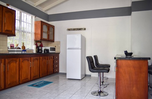 Giraudel Apartment | Luxury Green Castle Apartment#2 in Roseau