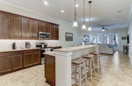 American Beach Condo | Luxury ground level condo. Golf cart, bikes, included.
