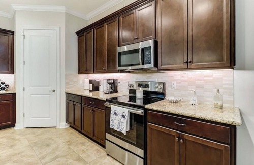 American Beach Condo | Luxury ground level condo. Golf cart, bikes, included.