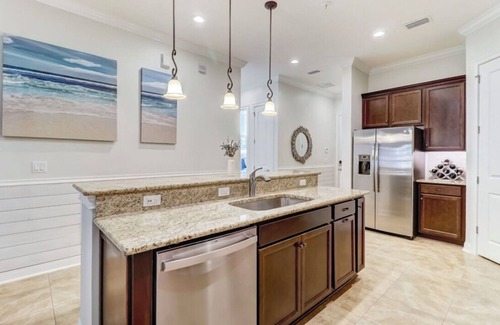 American Beach Condo | Luxury ground level condo. Golf cart, bikes, included.