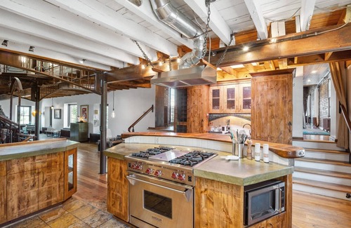 Downtown East House | Luxury Historic Home Next to US Bank Stadium. Private Courtyard + Rooftop.