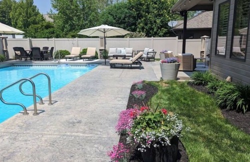 Omaha House | Luxury Home with Heated Saltwater Pool