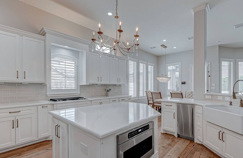 Cypress House | Luxury home with immaculate design, outdoor & chef's kitchen, home gym