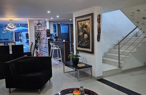 Calle 26 House | Luxury house in Bogota, Col, central, patio, fireplace, bbq, jacuzzi, 12 people