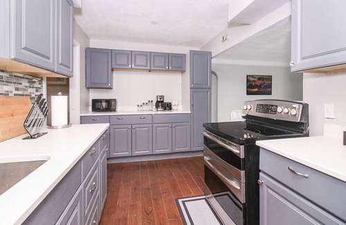 Cleveland House | Luxury King Getaway w/Private Bath, Fast Wi-Fi, Private Garage, & Fenced Yard!