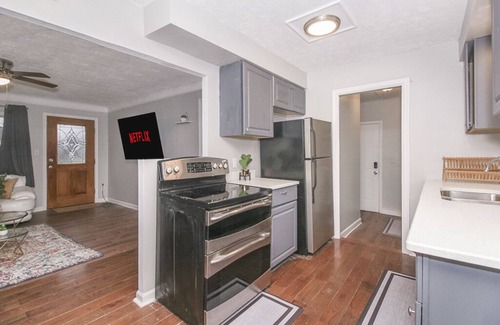 Cleveland House | Luxury King Getaway w/Private Bath, Fast Wi-Fi, Private Garage, & Fenced Yard!