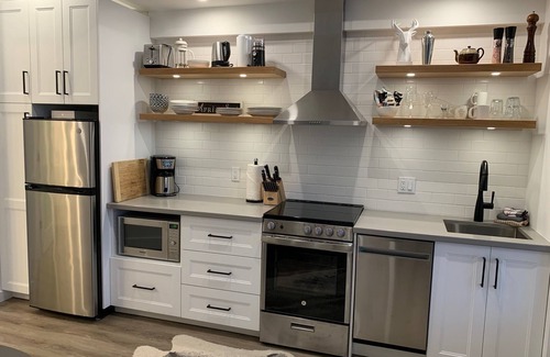 Village North Apartment | Luxury King Suite in Village North- The Nest