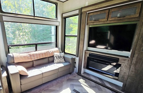 Waubun RV Rental | Luxury Lakefront Glamping near Itasca State Park + wifi, fit pit, & gas grill