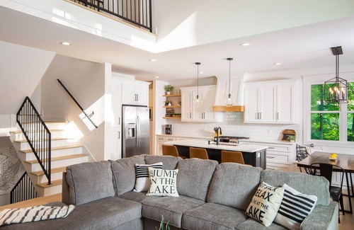 Florence House | Luxury Lakefront home with gorgeous views, screened patio, firepit, & boat dock