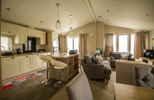 Hunstanton Cabin | Luxury lodge with decking in Hunstanton at Manor Park ref 23144K