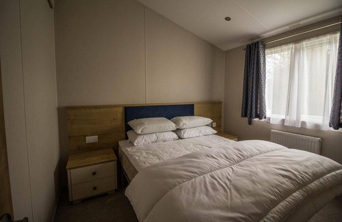 Hunstanton Cabin | Luxury lodge with decking in Hunstanton at Manor Park ref 23144K