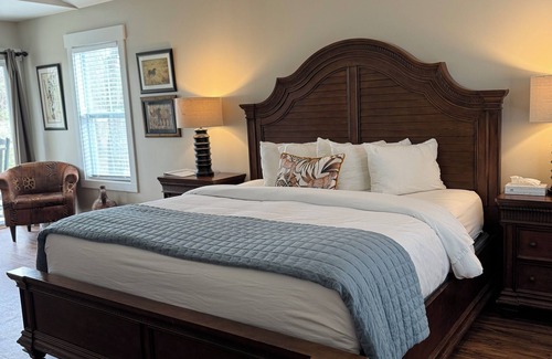 Elizabethtown Resort | Luxury Lodging, Lakefront View, King Bed w/Private Bath, Private Patio.
