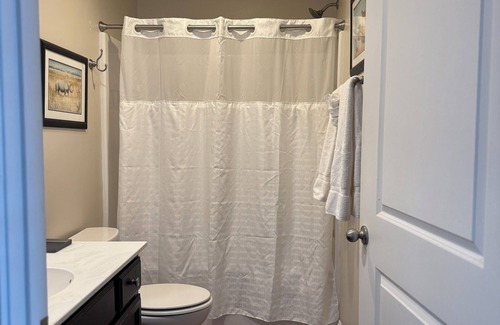 Elizabethtown Resort | Luxury Lodging, Lakefront View, King Bed w/Private Bath, Private Patio.
