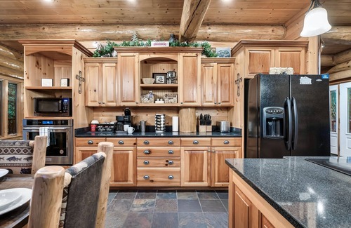 Pittman Center Cabin | Luxury Log Cabin with Hot Tub, Fire Pit, Game Loft in the Smokies