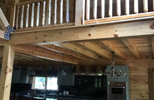 Meredith Cabin | Luxury Log home steps from private beach in Meredith on Lake Winnipesaukee.