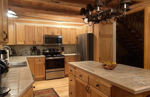 Pagosa Springs Cabin | Luxury Log Home with Hot Tub on 7+ Acres Featured In Log Home Digest. Sleeps 10