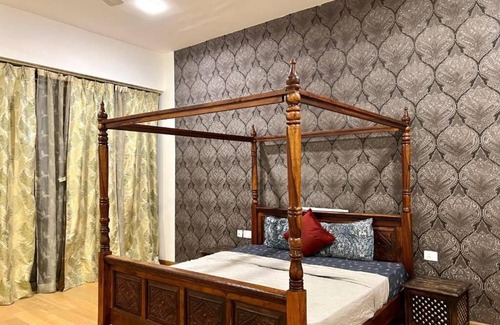 Chhatarpur Apartment | luxury master bedroom with bathtub n private entry