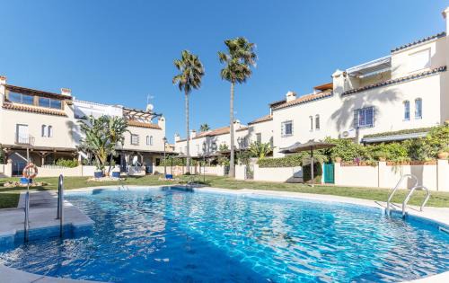Marina de Casares House | Luxury modern beachfront 3 bed gated community townhouse with pool, sun terrace, sea views close to all amenities