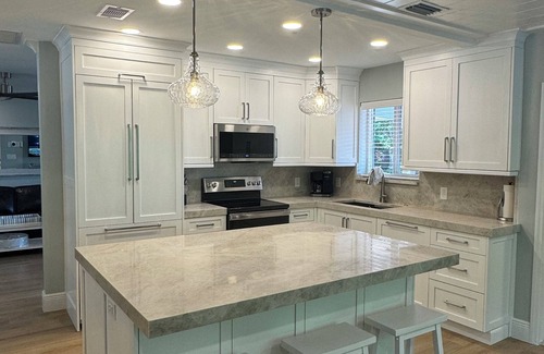 Totterdale House | LUXURY OASIS WITH HEATED POOL & SPA NEAR DOWNTOWN DELRAY & THE BEACH