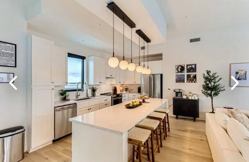 River North Art District Apartment | Luxury penthouse in enchanting Denver with bar, gym, pool, sauna & more