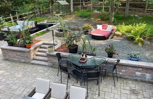 East Stroudsburg House | Luxury Poconos retreat with hot tub, sauna, fire pit & patio