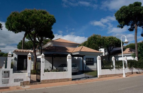Nuevo Portil Villa | Luxury Private Villa with private swimming pool, courtyard and gardens.