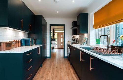 Chatham House | Luxury Renovated Bungalow with wheel chair access, Hot Tub and Fire Pit