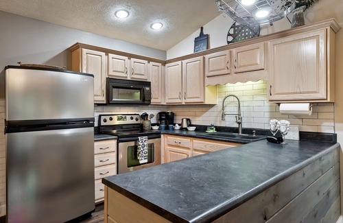 Sevierville Cabin | Luxury Retreat w/Hot Tub, Arcade, Huge Rec Room & Prime Location