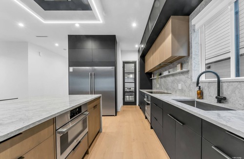 Surrey House | Luxury River View Home