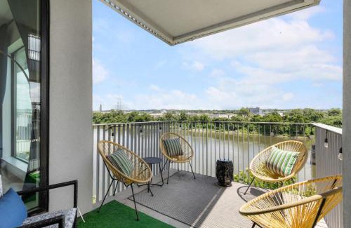 North Capitol House | Luxury Riverview Walk to Broadway with Garage and Patio