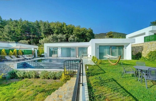 Kas Ski Chalet | Luxury sea view hillside villa with a pool, indoor jacuzzi.