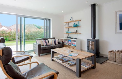 East Preston Cottage | Luxury seaside home with beautiful south facing garden on private sea estate.