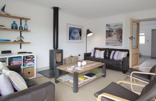 East Preston Cottage | Luxury seaside home with beautiful south facing garden on private sea estate.
