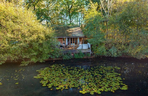 Earls Colne Cabin | Luxury secluded lakeside cabin with hot tub. Pet Friendly!