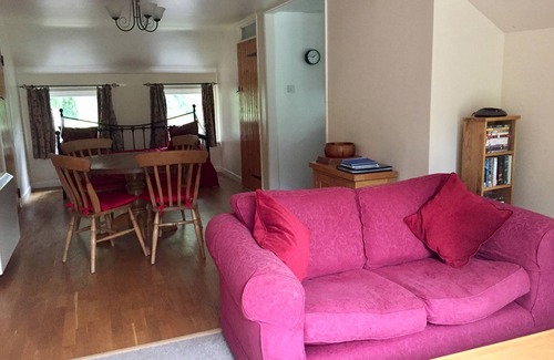 Sutton House | Luxury Single Storey Wooden Clad Colonial Style Cottage In Countryside Setting.