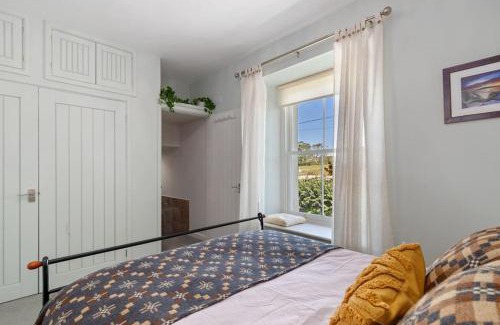 Cardigan House | Luxury three bedroom coastal cottage