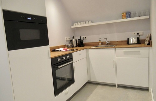 Lioessens Apartment | Luxury vacation studio near the Wadden Sea with private sauna.