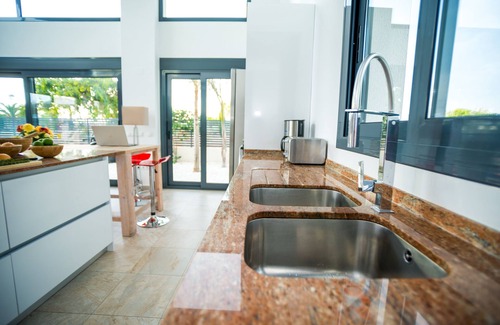 Los Cuarteros Villa | Luxury Villa walking distance to the beach, located next to a park.