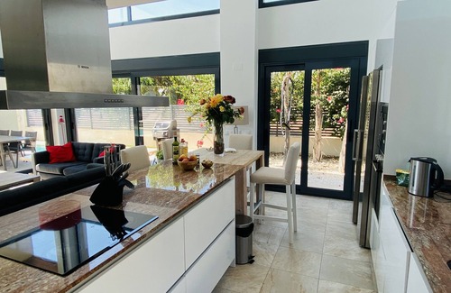 Los Cuarteros Villa | Luxury Villa walking distance to the beach, located next to a park.
