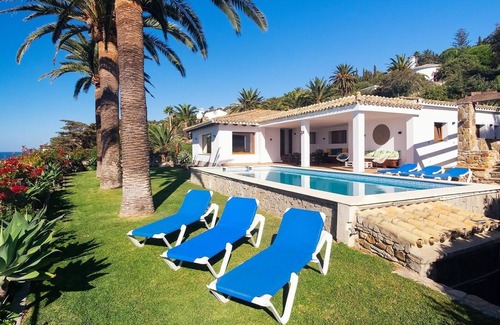 Atlanterra Villa | Luxury villa in 'Playa Atlanterra' with Sea View, Pool, Garden & Wi-Fi