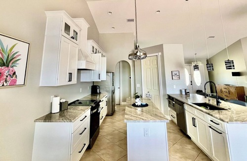 Burnt Store Villa | Luxury Villa, Heated INFINITY-EDGE SALT POOL on Golf Course lake