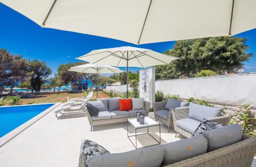 Punat Villa | Luxury villa Punat with pool with sea view , 50m from the beach by WiiBuk