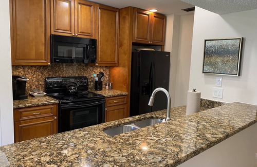 Hunt Club Condo | Luxury Villa in PGA gated community, communal pool, nearby beaches & restaurants