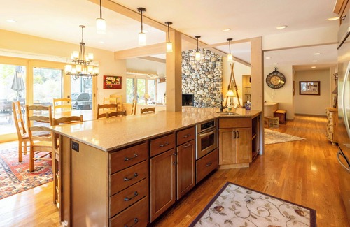 Warm Springs House | Luxury Warm Springs Retreat: Riverfront, Hot Tub, & Steps to Lifts