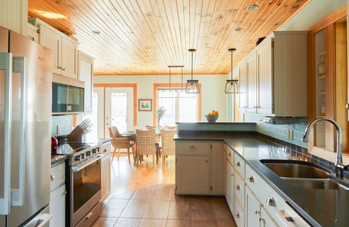 French River House | Luxury Water View Home With 2 Living Spaces Hot Tub & Access To River