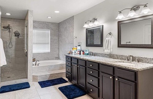 McGregor House | Luxury Waterfront Home w Pool HotTub and Waterslide. Off McGregor near Beaches