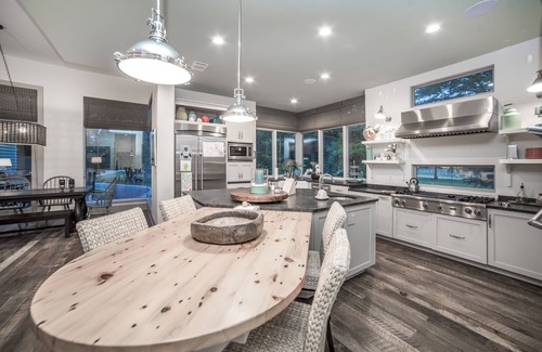 McQueeney House | Luxury Waterfront Lakehouse with Volleyball, Boat Dock, Fire Pit, 8 bedrooms