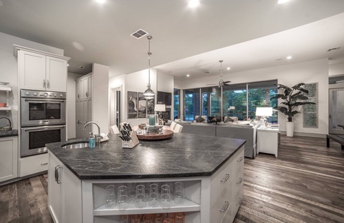 McQueeney House | Luxury Waterfront Lakehouse with Volleyball, Boat Dock, Fire Pit, 8 bedrooms