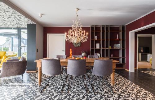 Krakow am See Apartment | Luxus FeWo 122 m² direkt am Wasser mit Boot