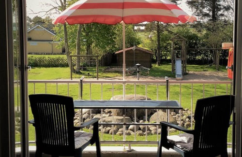 Kronsgaard Apartment | Lykkelig Ferie: bright apartment, south-facing balcony, beach 30 m, indoor pool, IR cabin, sauna